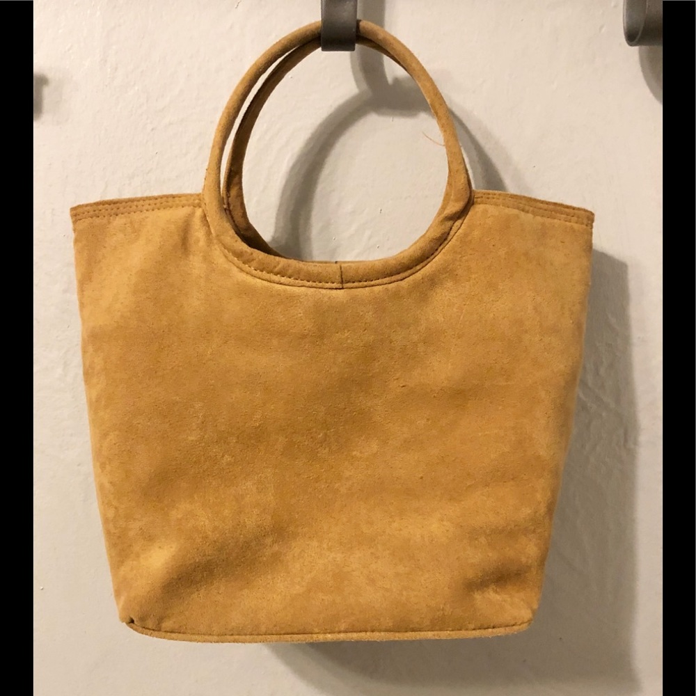 Micro suede camel colored ring handle purse